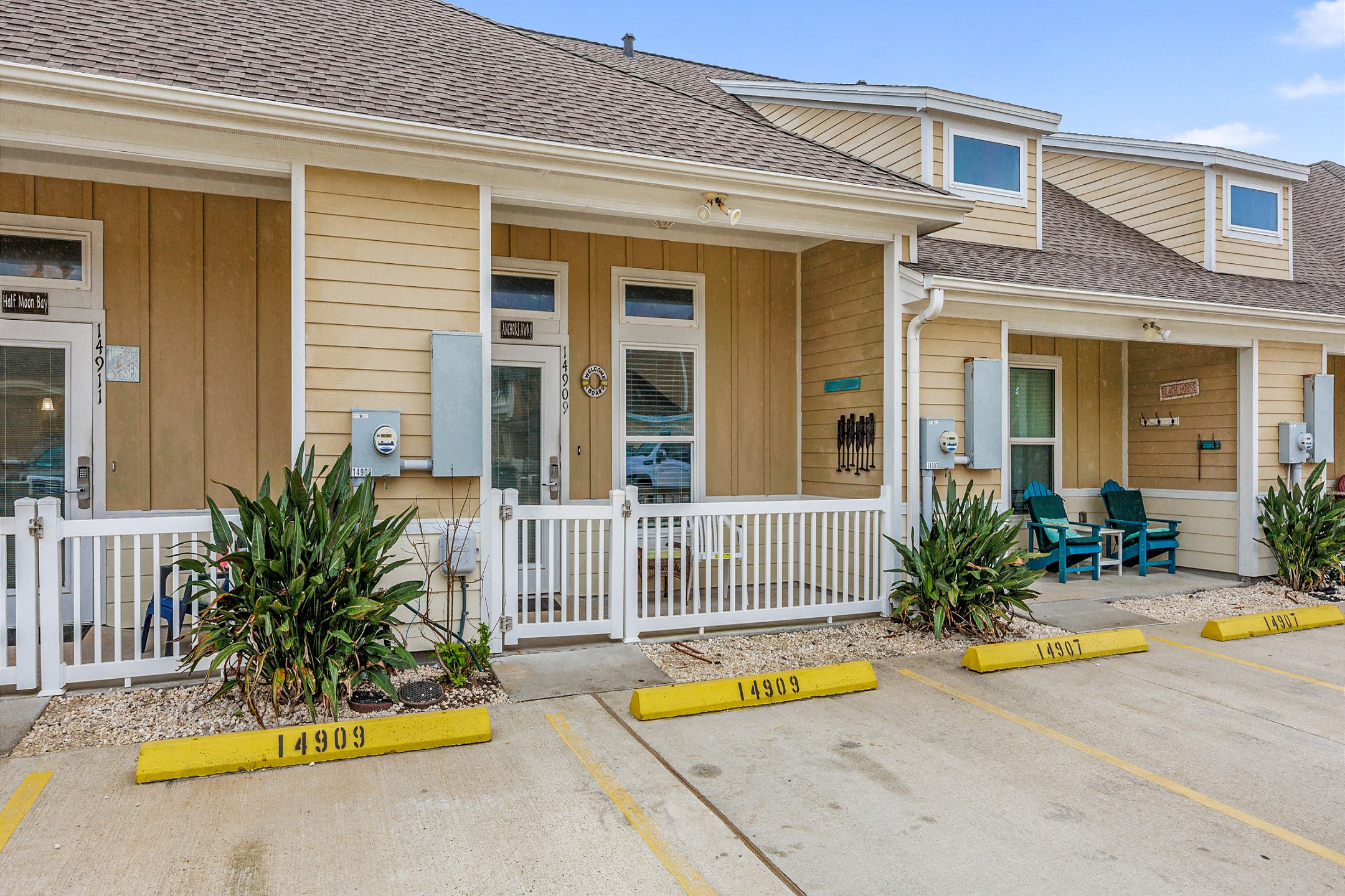 Front entrance with two reserved parking spots 
