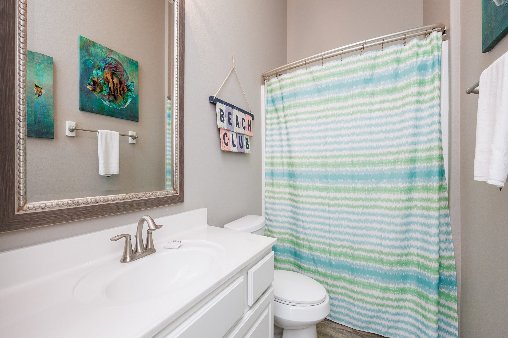 Guest bathroom with tub and shower combo