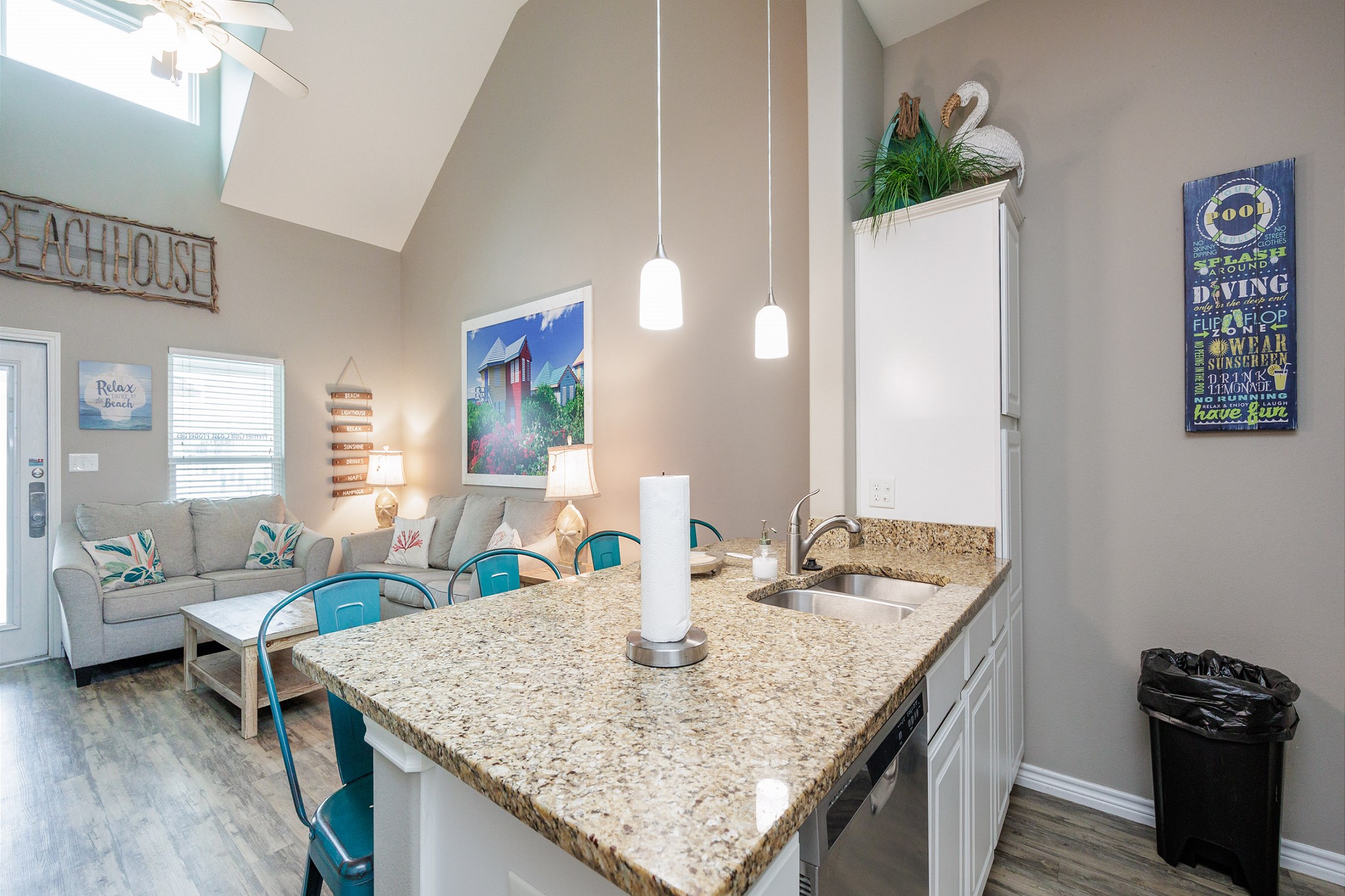 Open layout connecting the kitchen to the living and dining areas