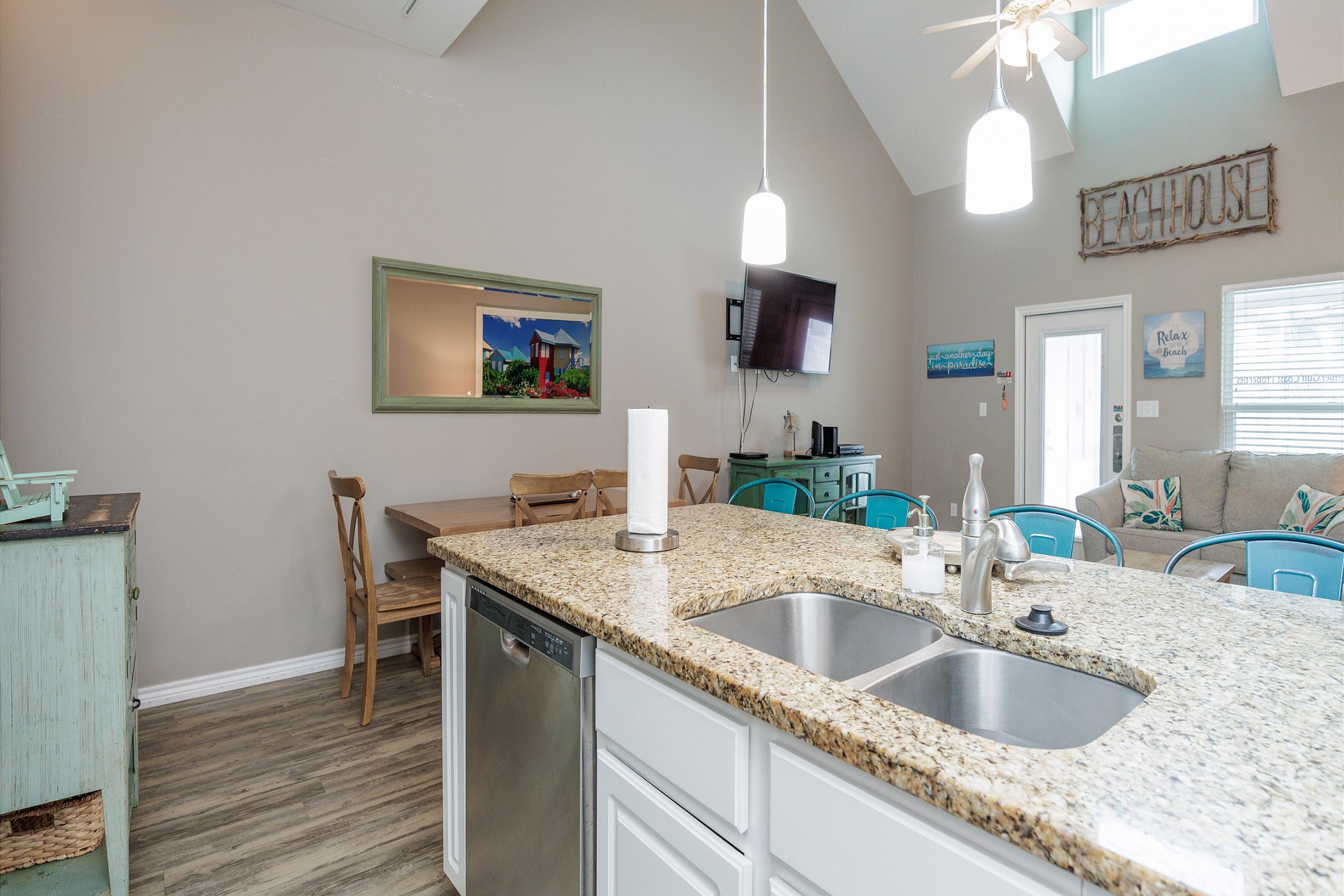 Open layout connecting the kitchen to the living and dining areas