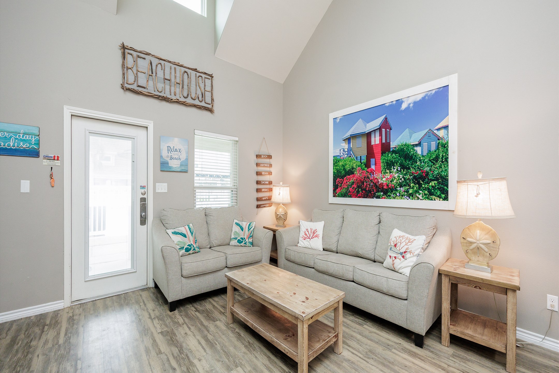 Big Shell vibes with an open-concept living area and a queen-size sleeper sofa for extra comfort