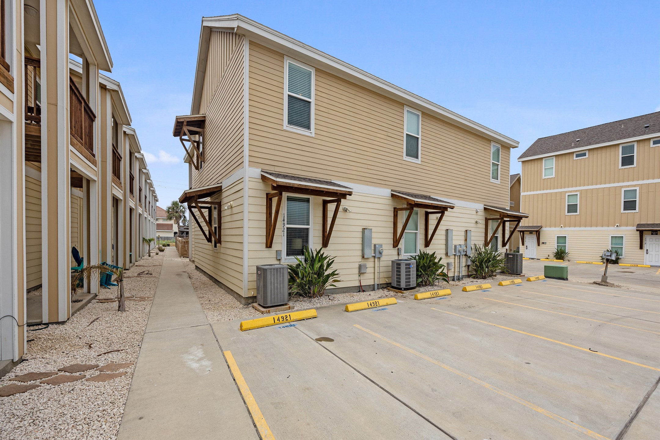 Reserved parking for two vehicles behind condo
