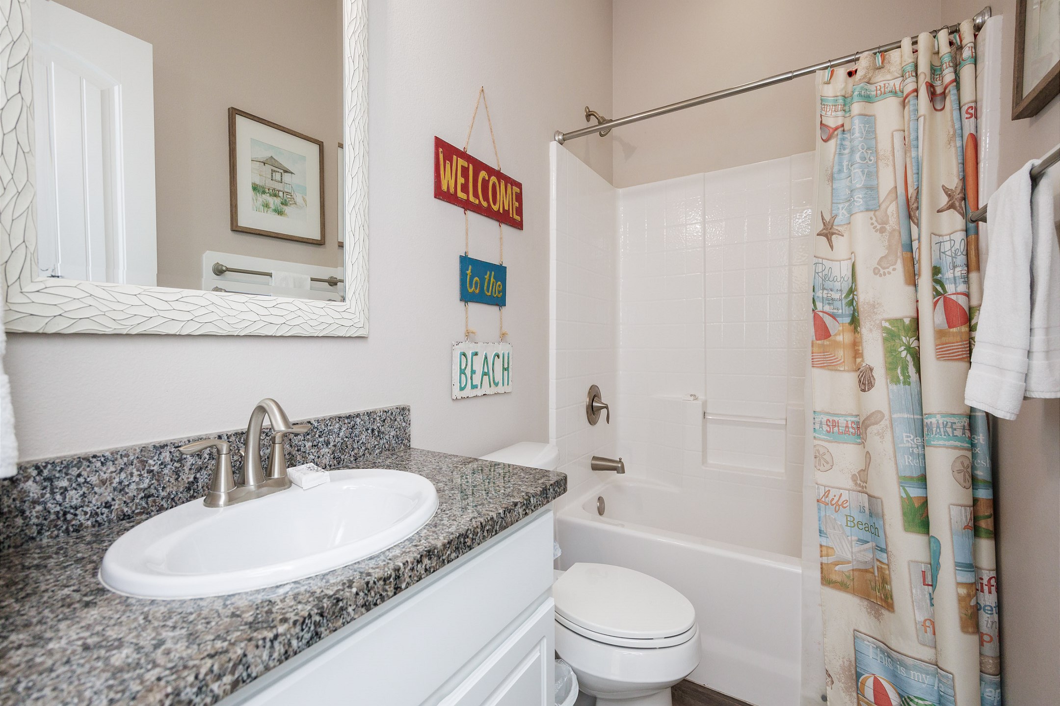 Guest bathroom on the first floor with tub/shower combo