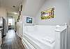 Hallway nook on the first floor with twin daybed and twin trundle bed