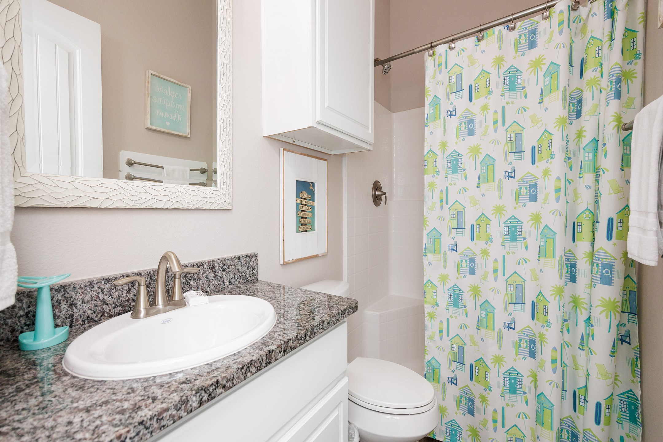 Private bathroom off the second bedroom with walk in shower