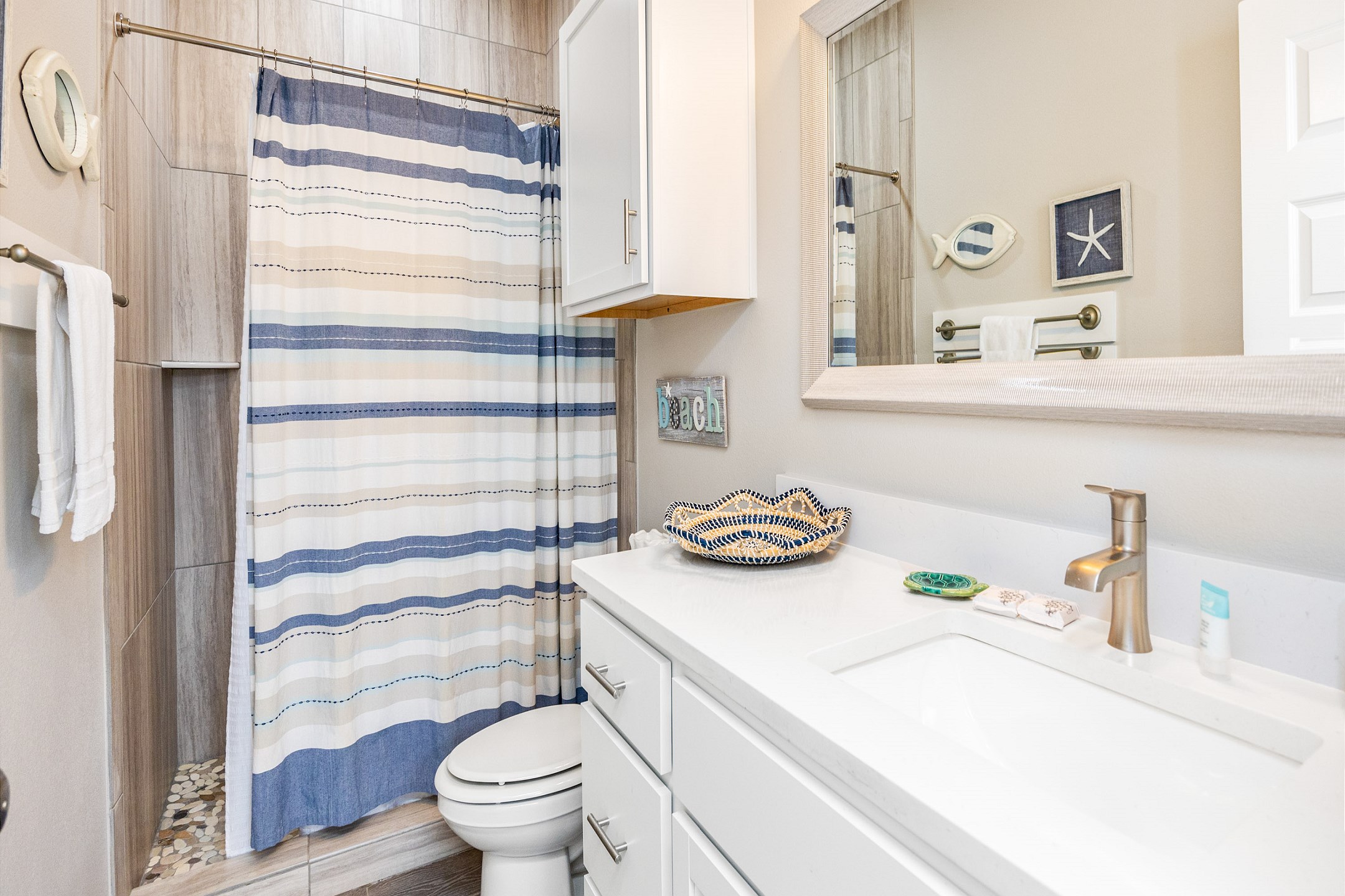 The attached guest bathroom with a walk-in shower is conveniently located on the second floor, right next to the third bedroom—providing extra privacy and comfort during your stay.