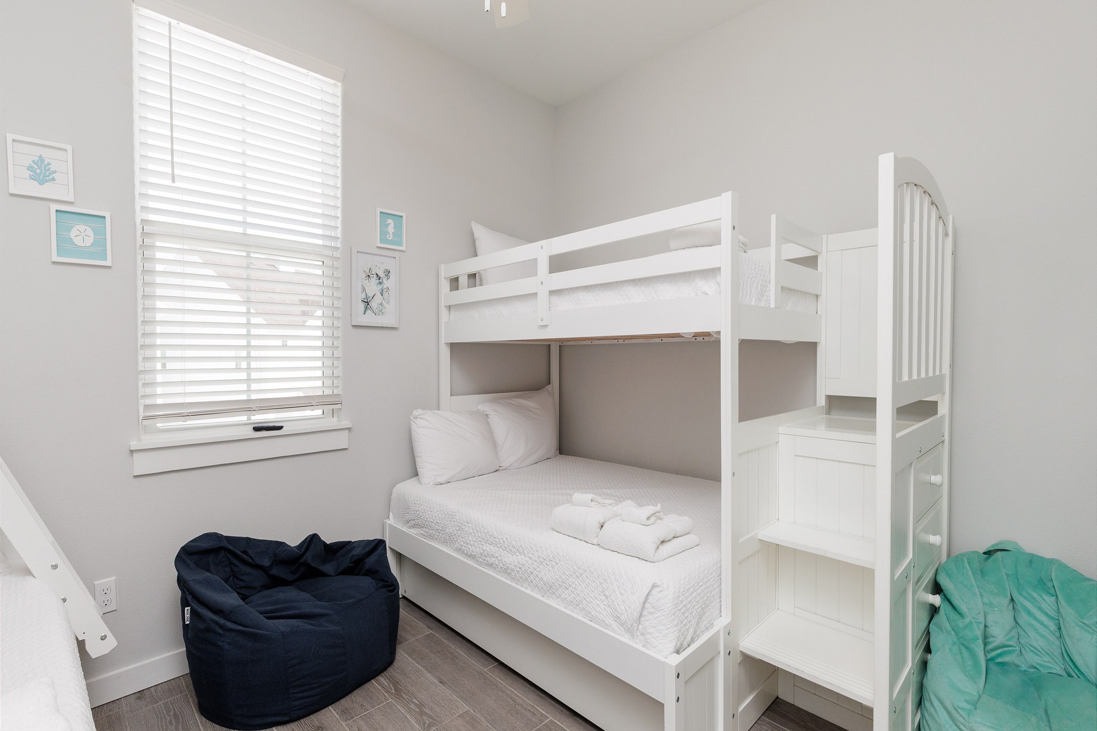 Fourth bedroom on the second floor with two sets of twin over full size bunk beds and flat screen TV