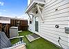 Back patio with artificial turf