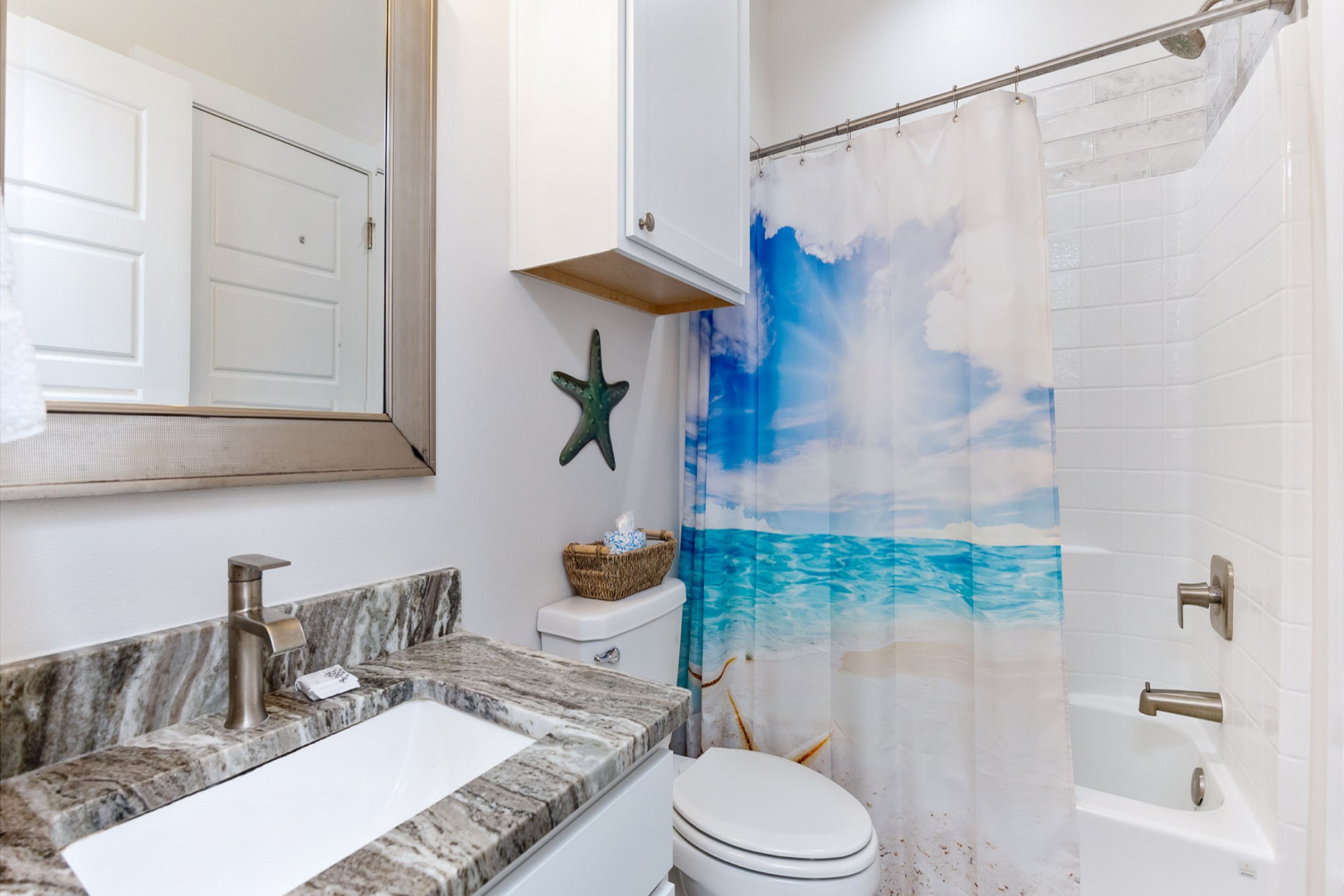 Guest bathroom on the second floor with tub/shower combo