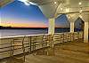 Enjoy beautiful sunsets of Lake Padre under the covered deck

