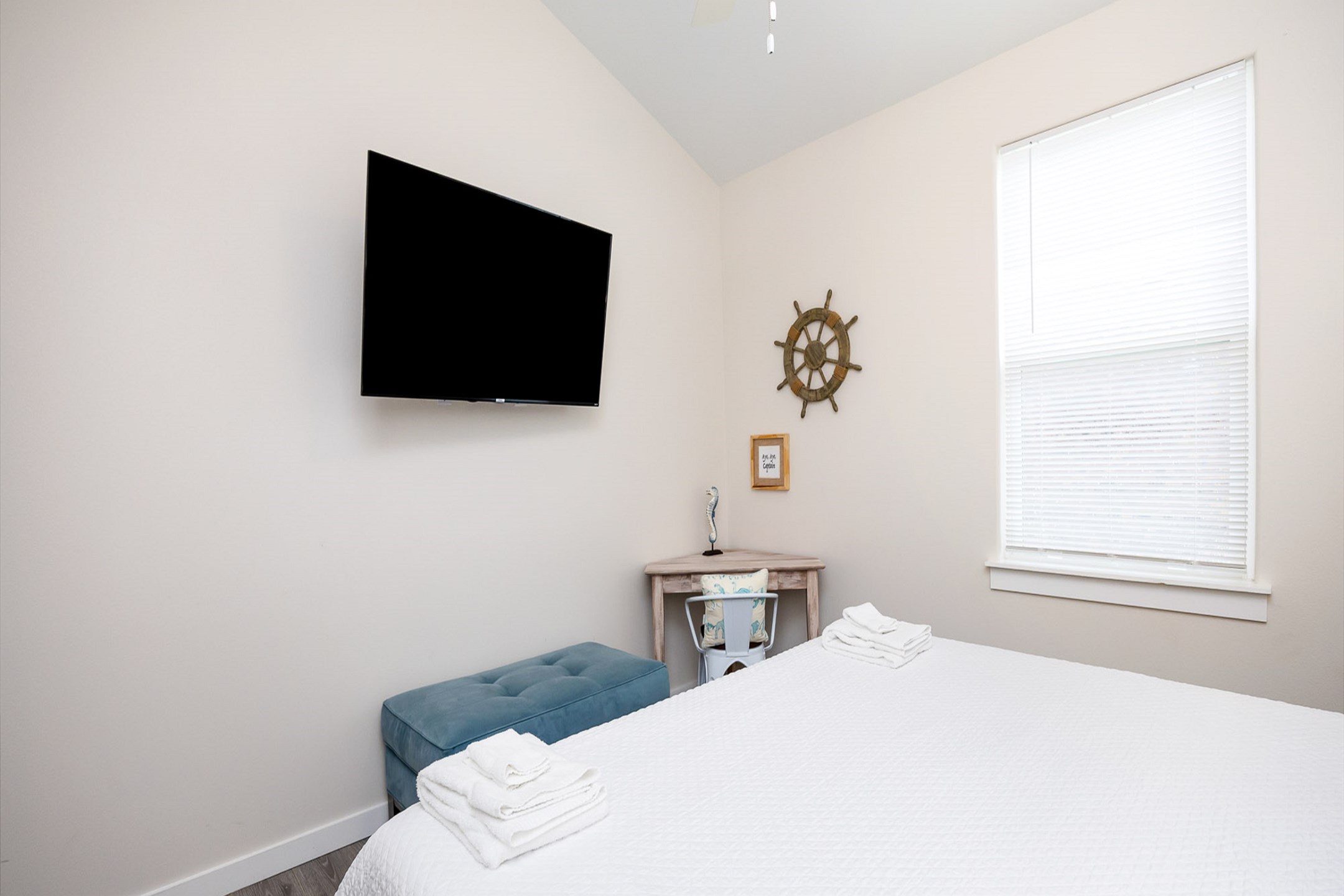 Master bedroom on the second floor with king size bed, private bathroom, and flat screen TV 