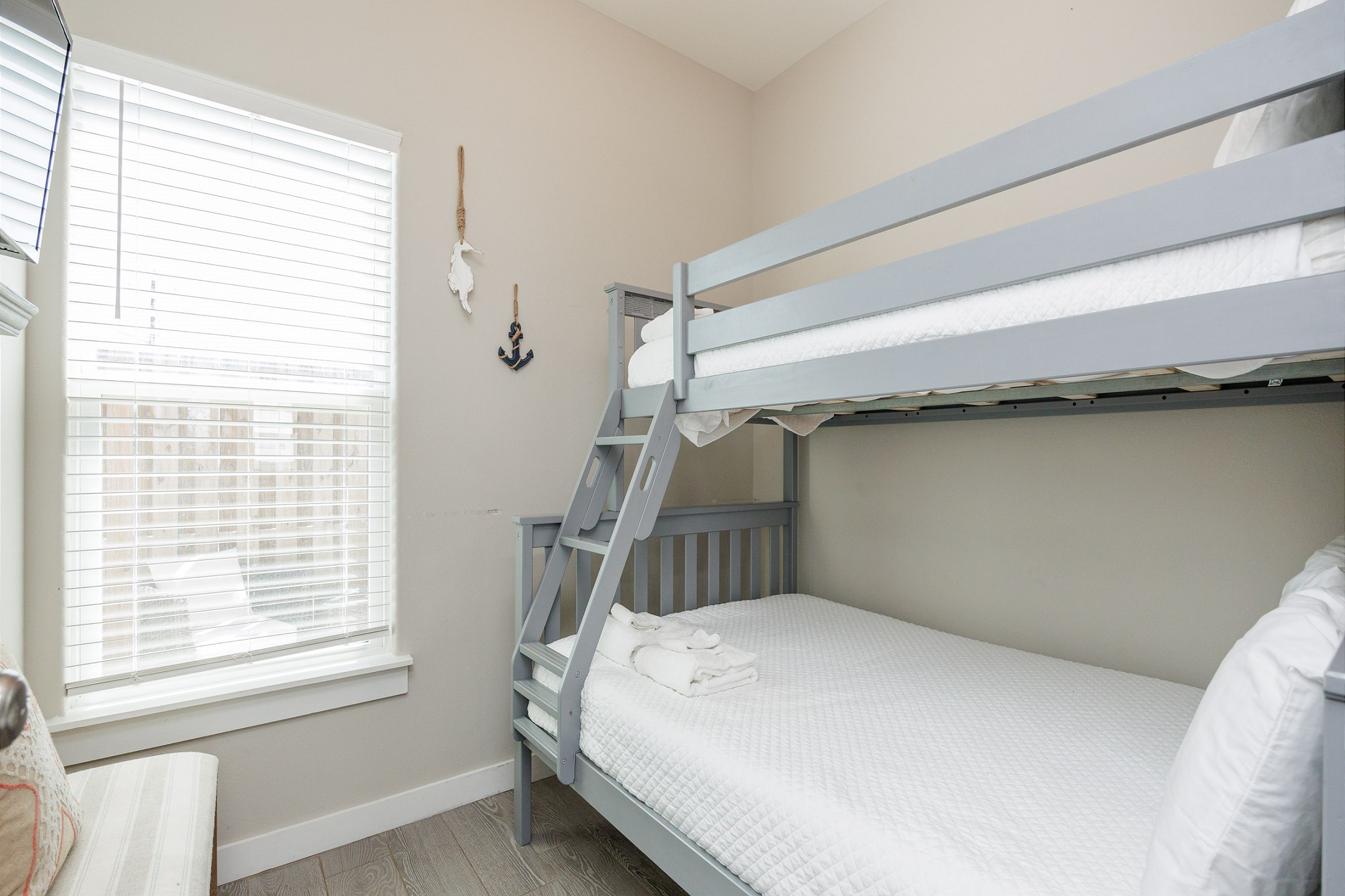 Second bedroom with twin over full size bunk bed and flat screen TV