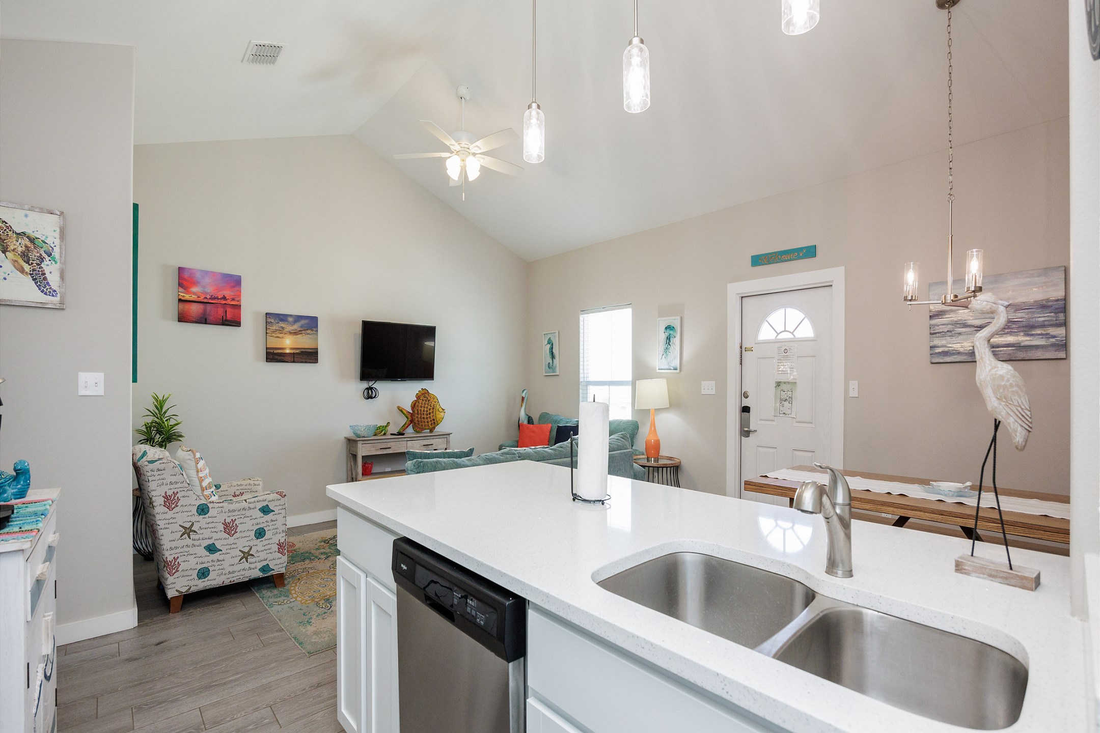 Kitchen area with coffee maker, toaster, cookware, dinnerware, and other kitchen essentials provided