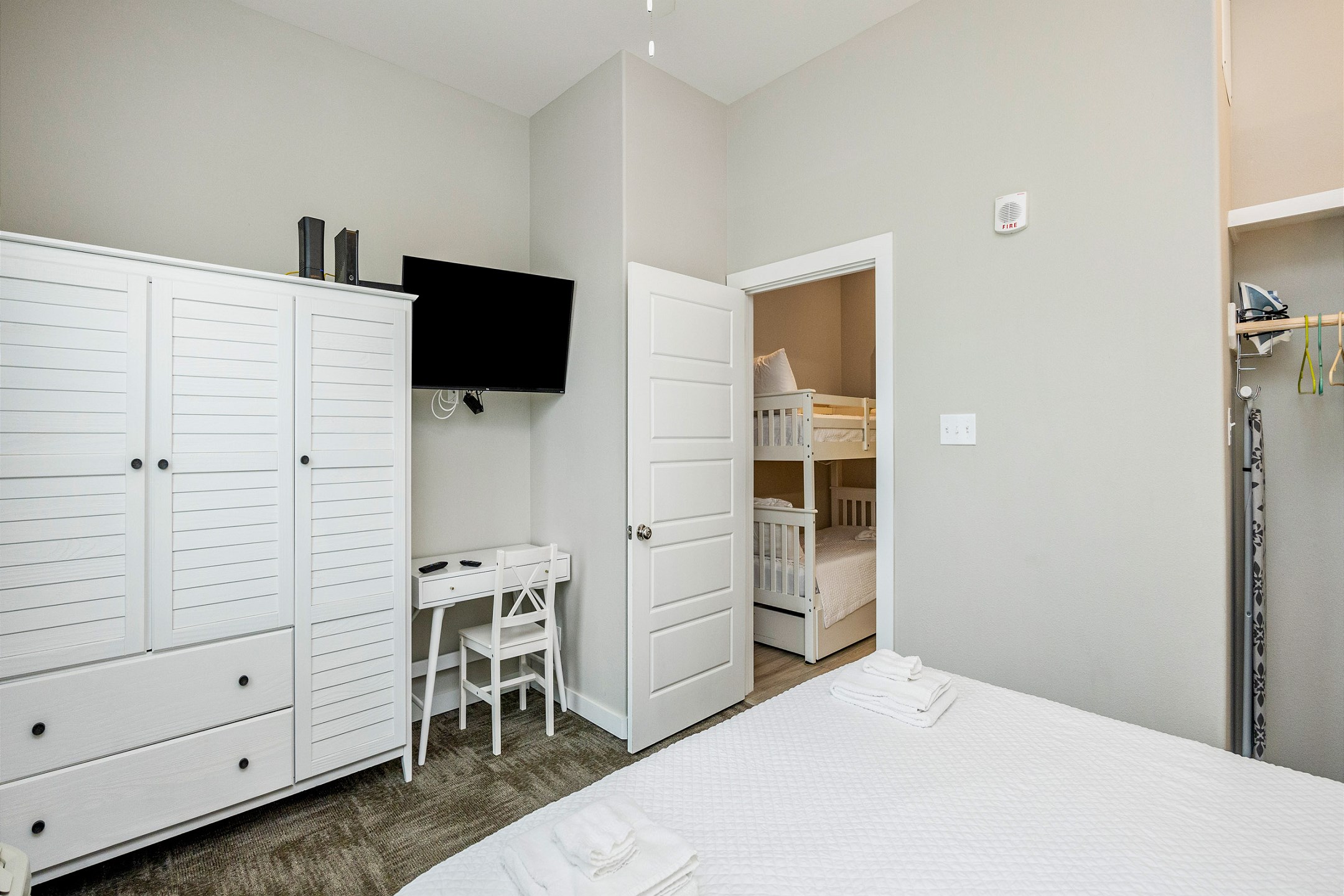 Master bedroom with king size bed and flat screen TV