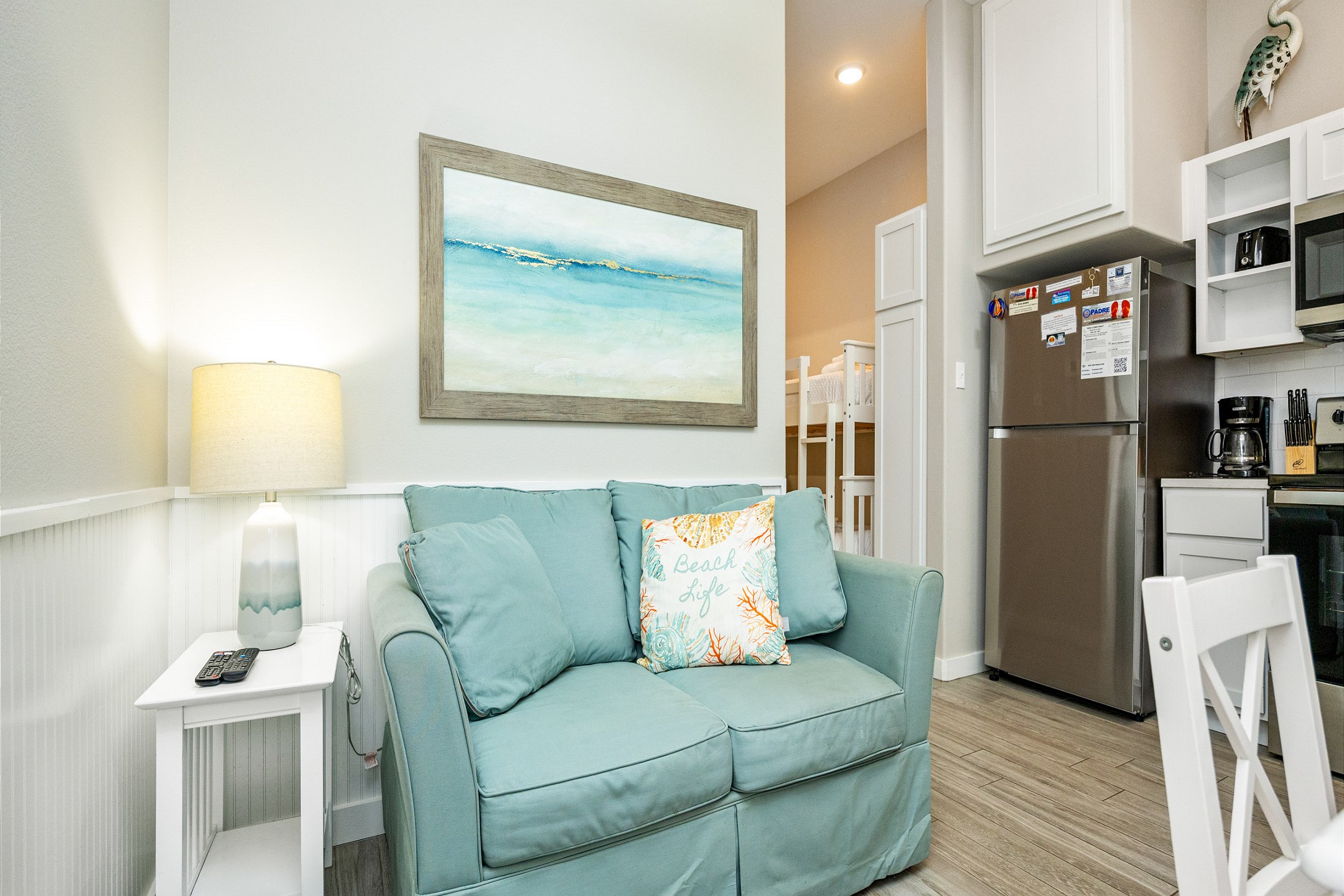 Kick back and relax in the bright, open-flow living, dining, and kitchen space