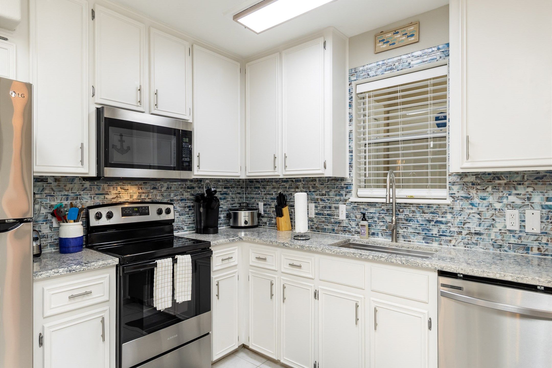 Spacious kitchen with plenty of counter space and storage