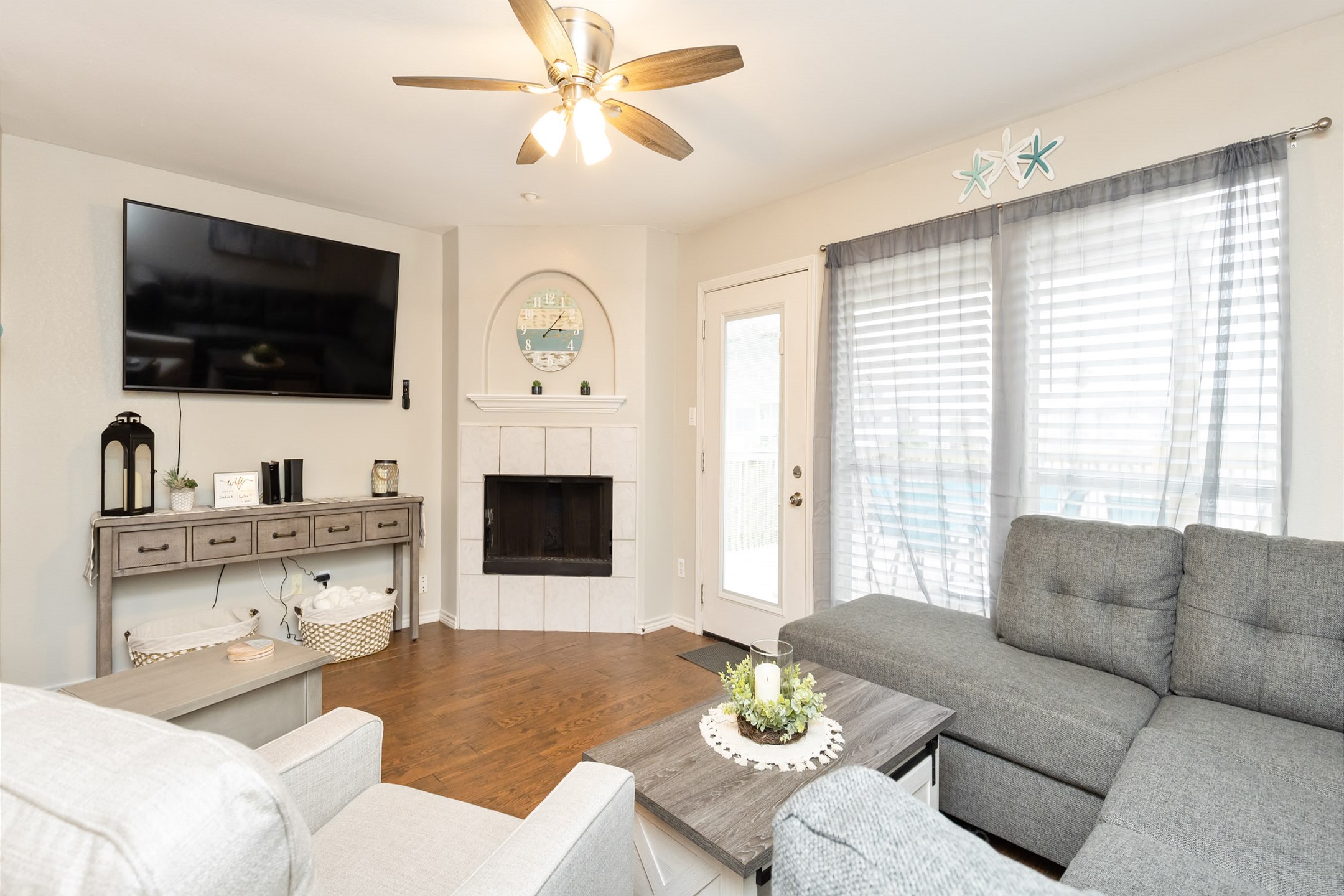 Spacious and cozy living room perfect for relaxation with flat-screen TV and streaming services 