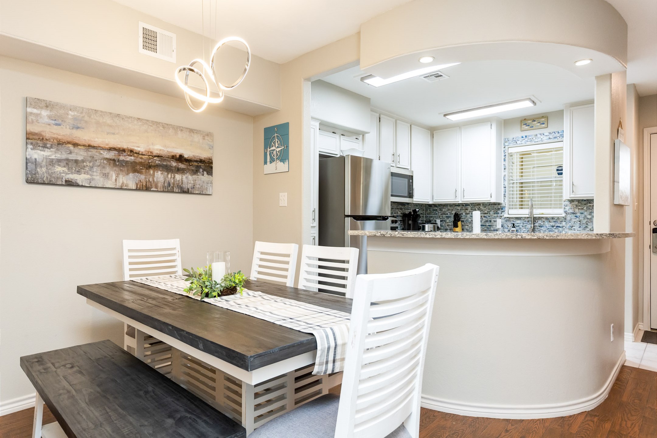 Dining area with seating for four and a bench
