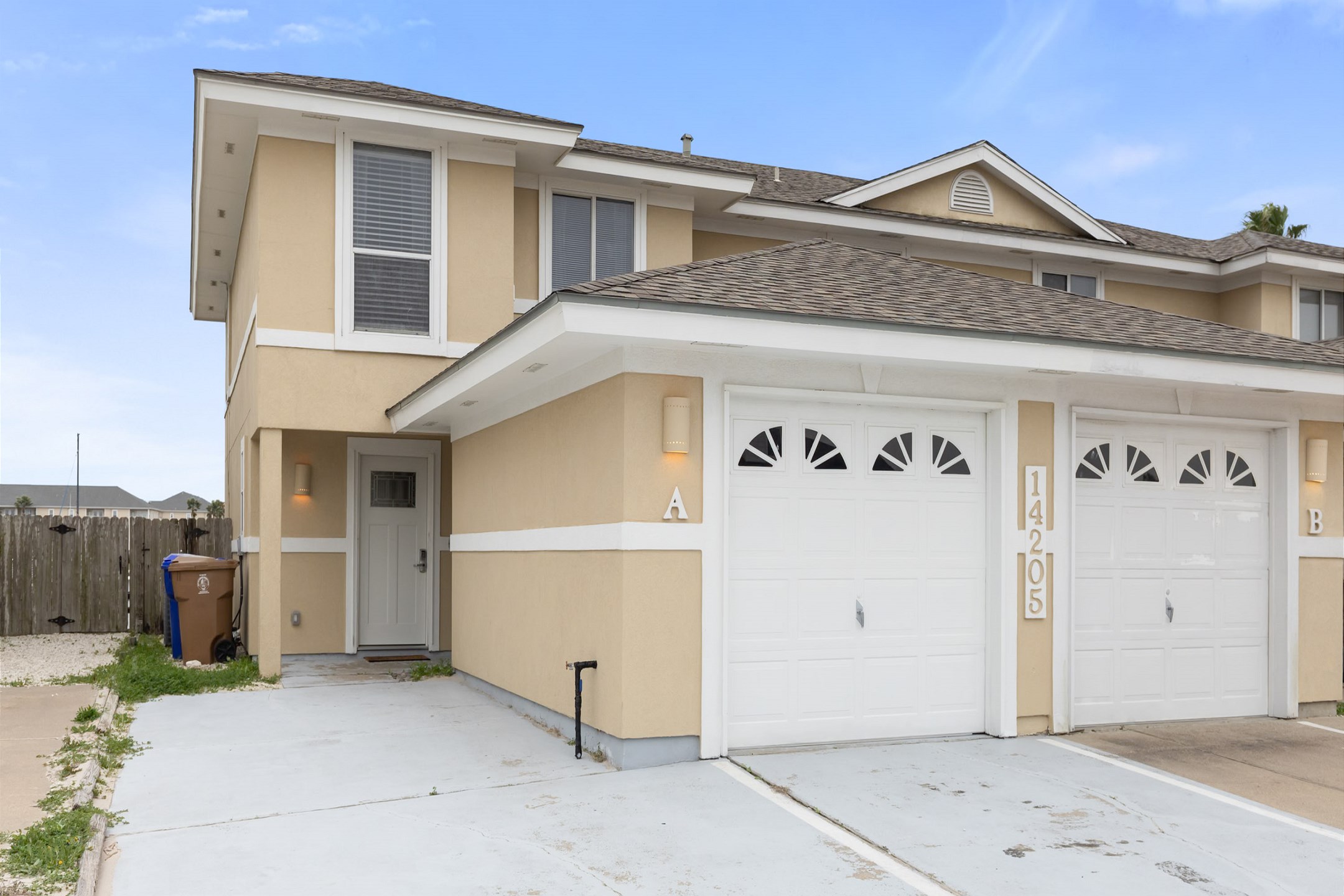 Front view of property with driveway parking (no garage access)