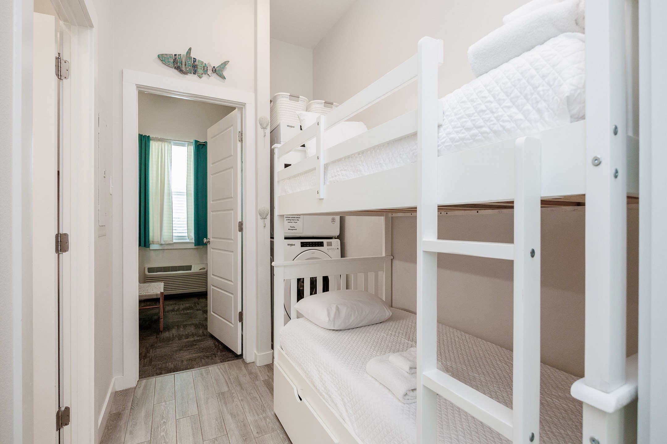 Twin over twin bunk bed in hallway nook 