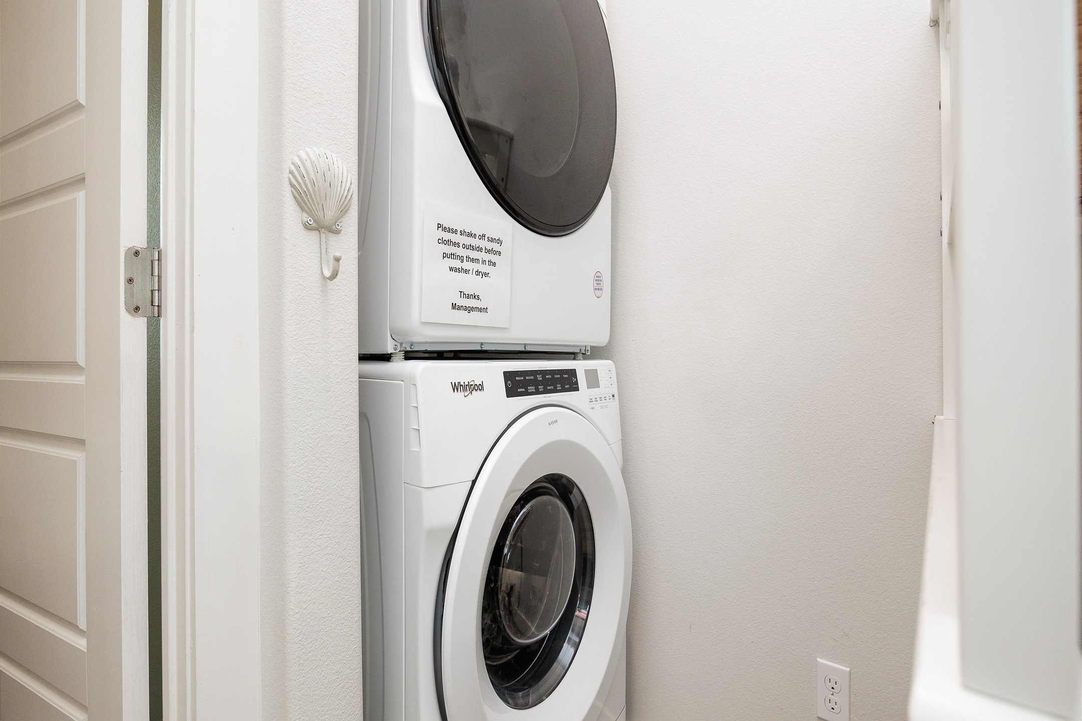Washer and dryer located in hallway nook