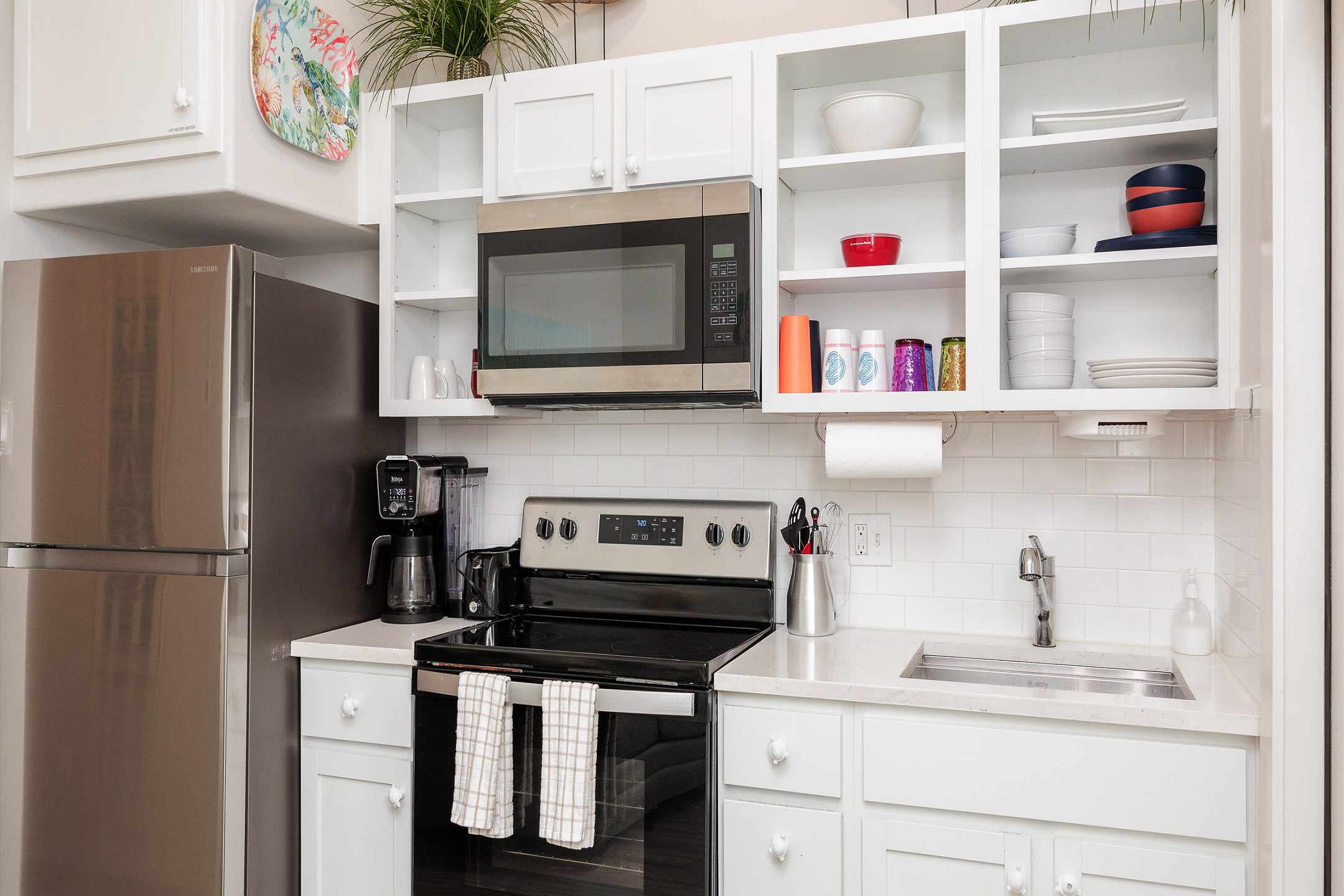 Fully equipped kitchen with stainless steel appliances and 12 cup coffee maker (no dishwasher)