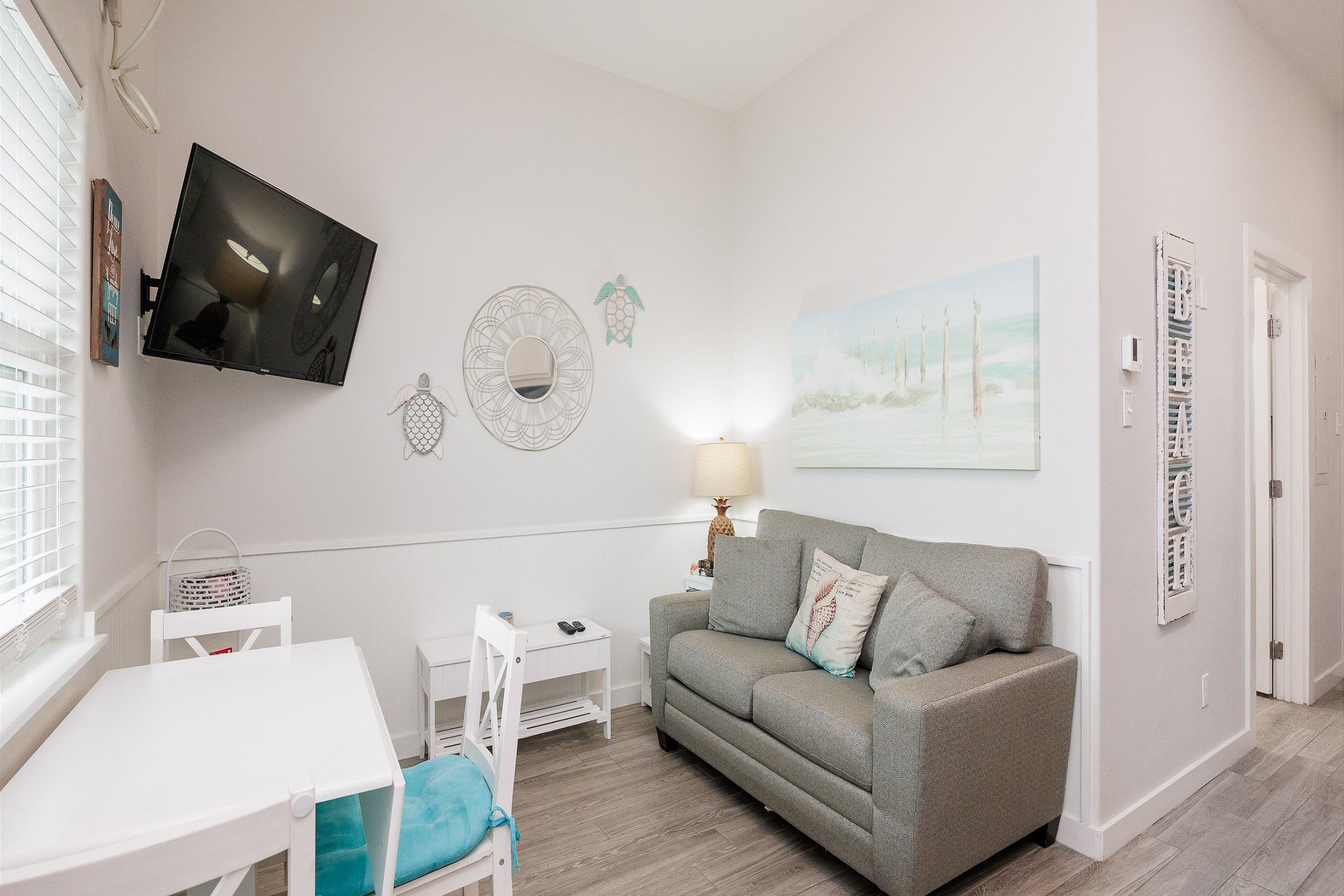 Open living area with comfortable seating and natural lighting 