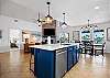 Open kitchen area overlooking the dining and living spaces