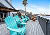 Large sun deck with cozy lounge chairs