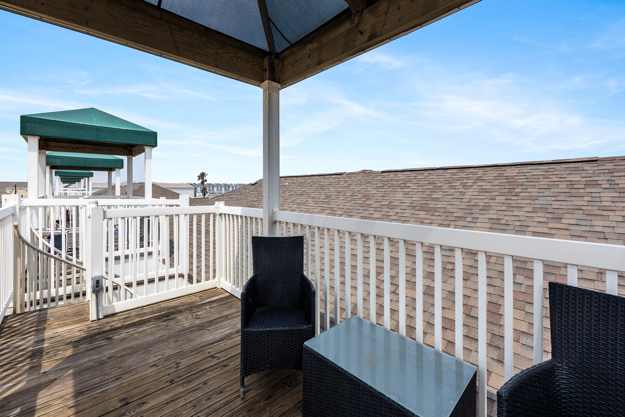 Savor your morning coffee or unwind with an evening drink on the top-level deck