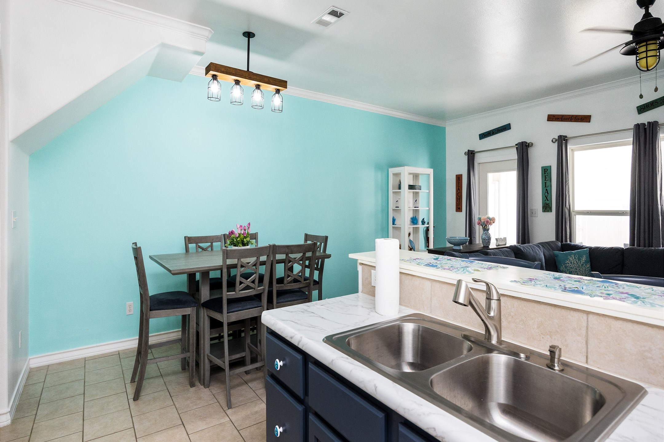 Open-concept layout connecting the dining area to the kitchen