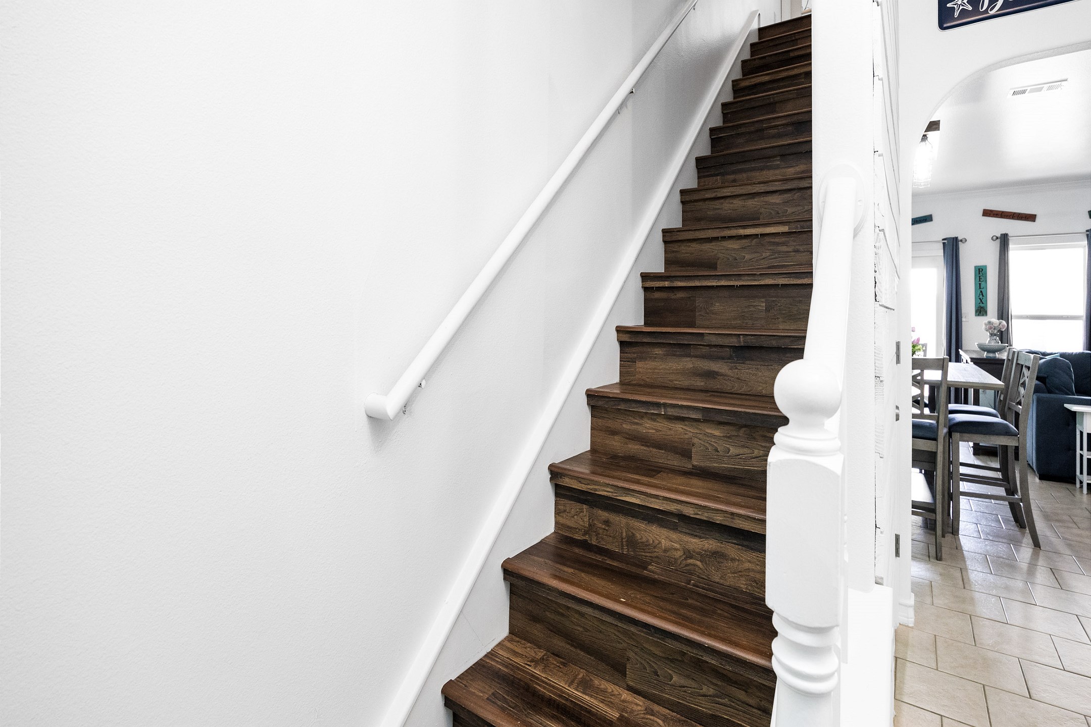 Stairs leading to the second floor, where all the bedrooms are located