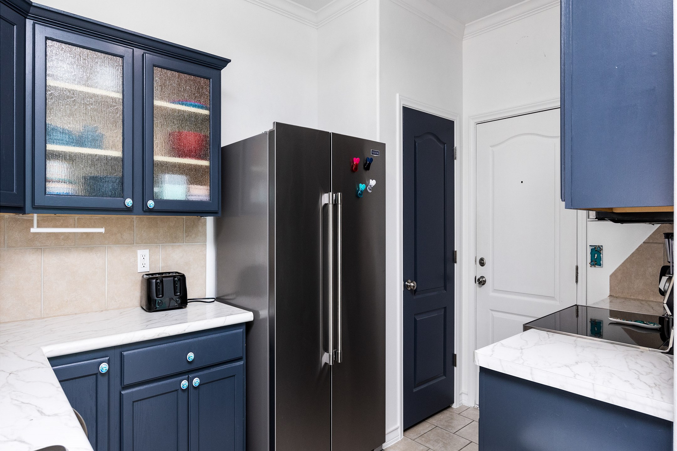 Modern kitchen with stainless steel appliances