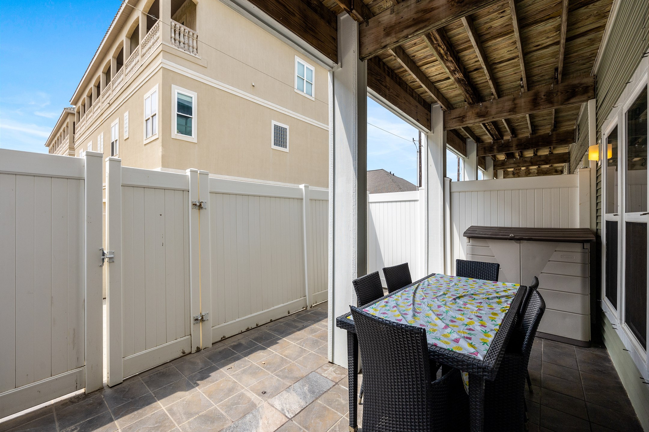 First-floor back patio right off the living room, perfect for relaxing outdoors