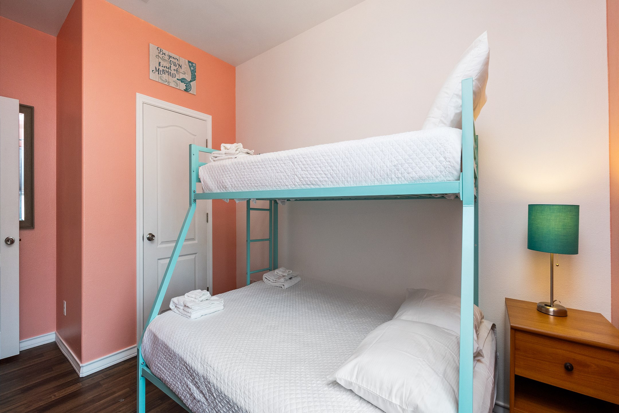 Third bedroom with twin over queen size bunk bed and flat screen TV