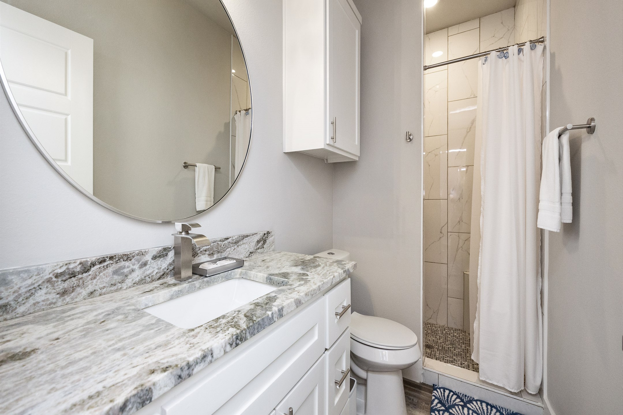 Guest bathroom on the first floor with walk-in shower 
