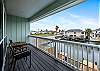 Balcony off of master bedroom with views of the canal
