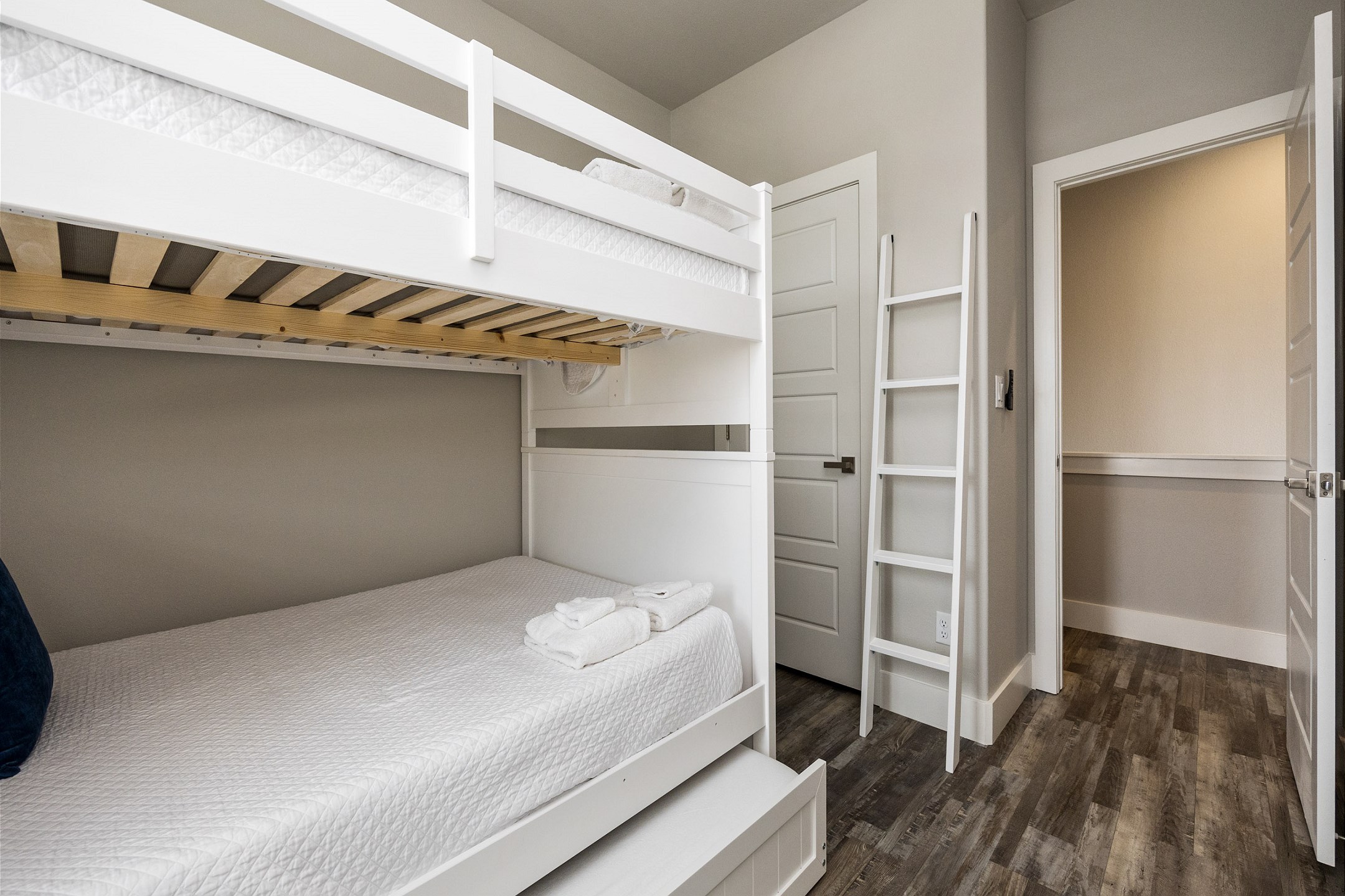 Second bedroom with full over full size bunk bed and twin trundle