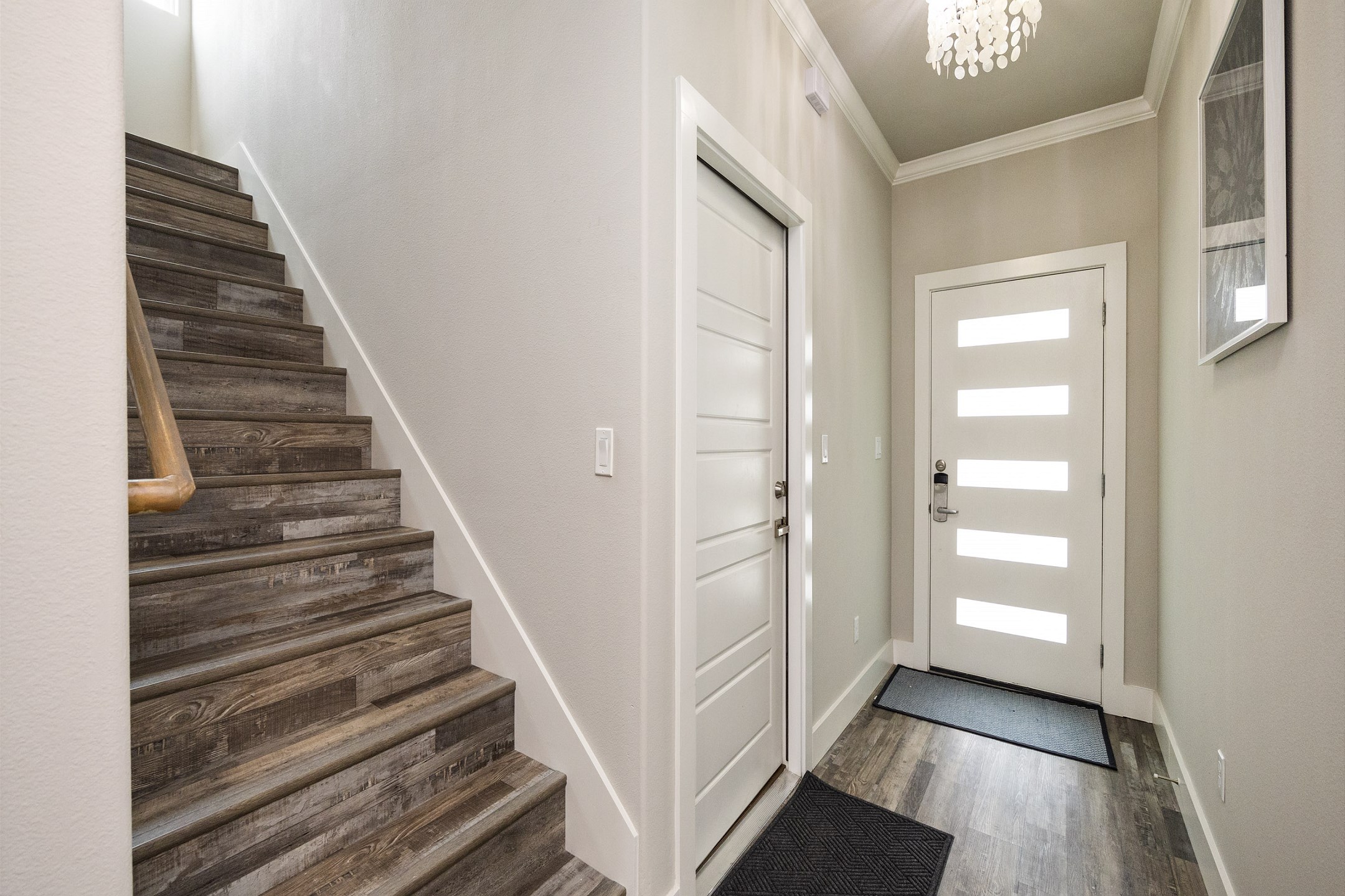 Staircase leading to the second floor, where all the bedrooms await