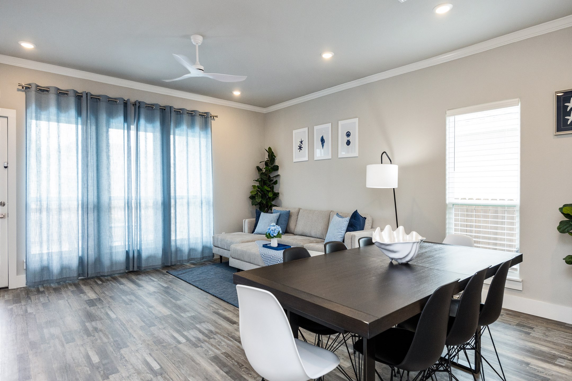 Dining area with seating for eight that opens up to the natural light