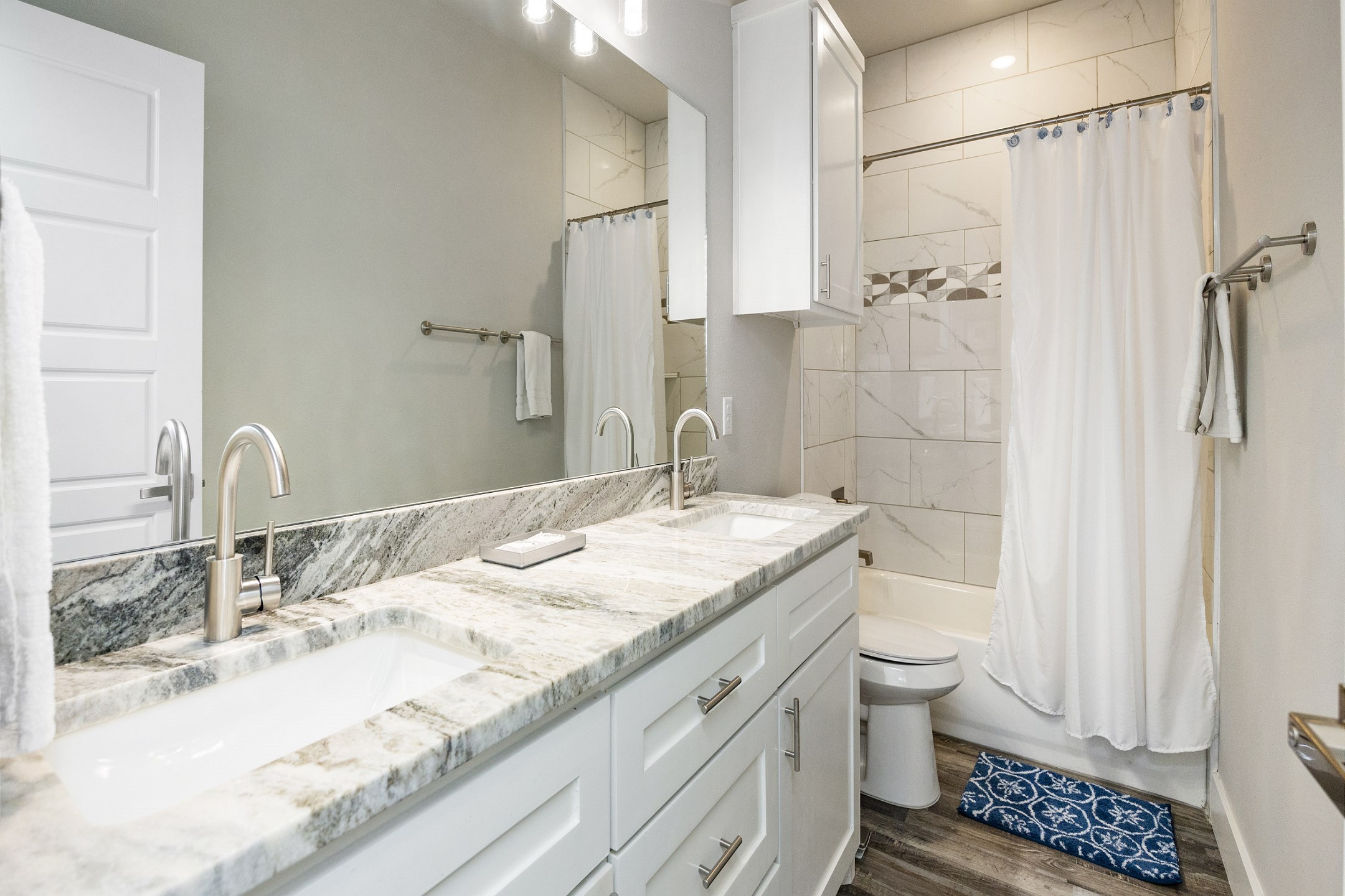 Guest bathroom on the second floor with tub/shower combo