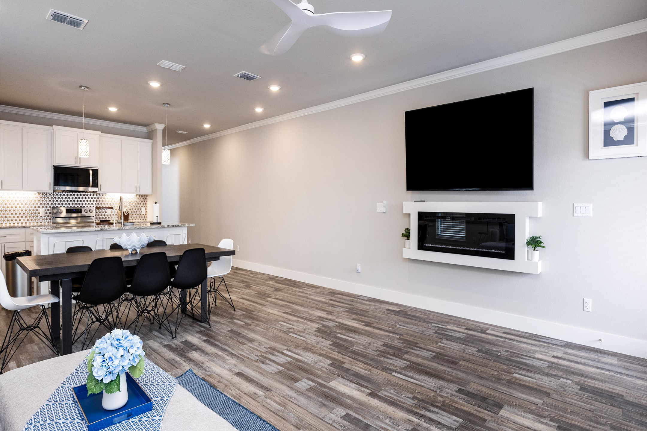 A beautifully integrated space where the living, kitchen, and dining areas come together seamlessly