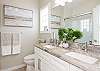 Master bathroom with double sinks and walk-in shower 