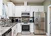 Fully equipped kitchen with stainless steel appliances 