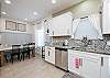 Kitchen opens into dining room