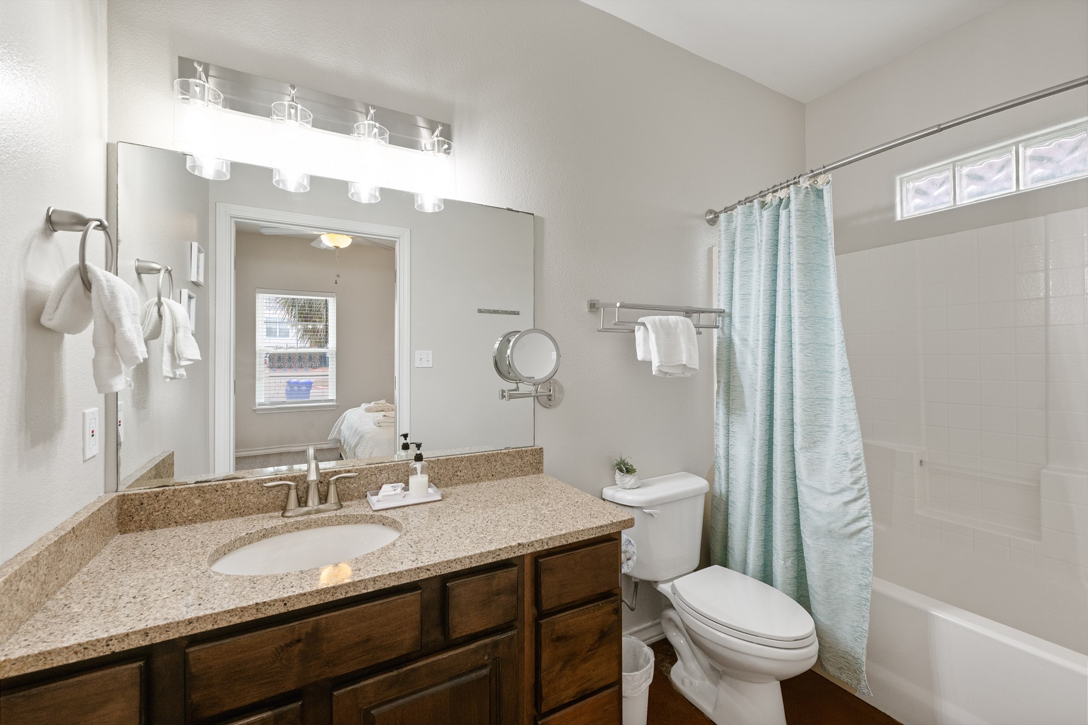 Comfortable master bathroom with full tub-shower combo for convenience