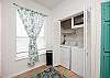 Washer and dryer in the kitchen area 