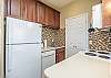 Fully equipped, modern kitchen area with storage 