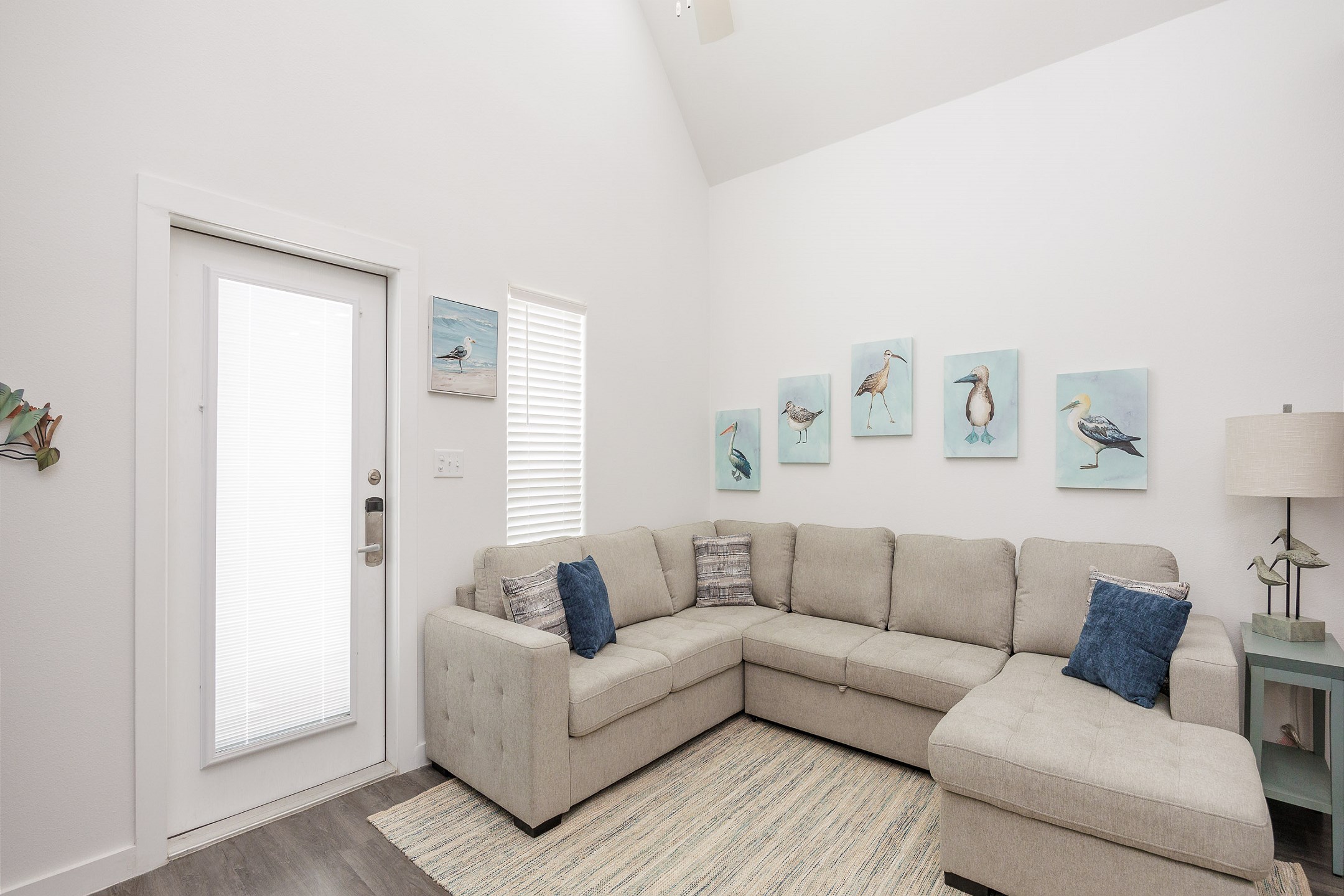 Newly updated living space with cozy sectional that turns into a full size sleeper sofa 