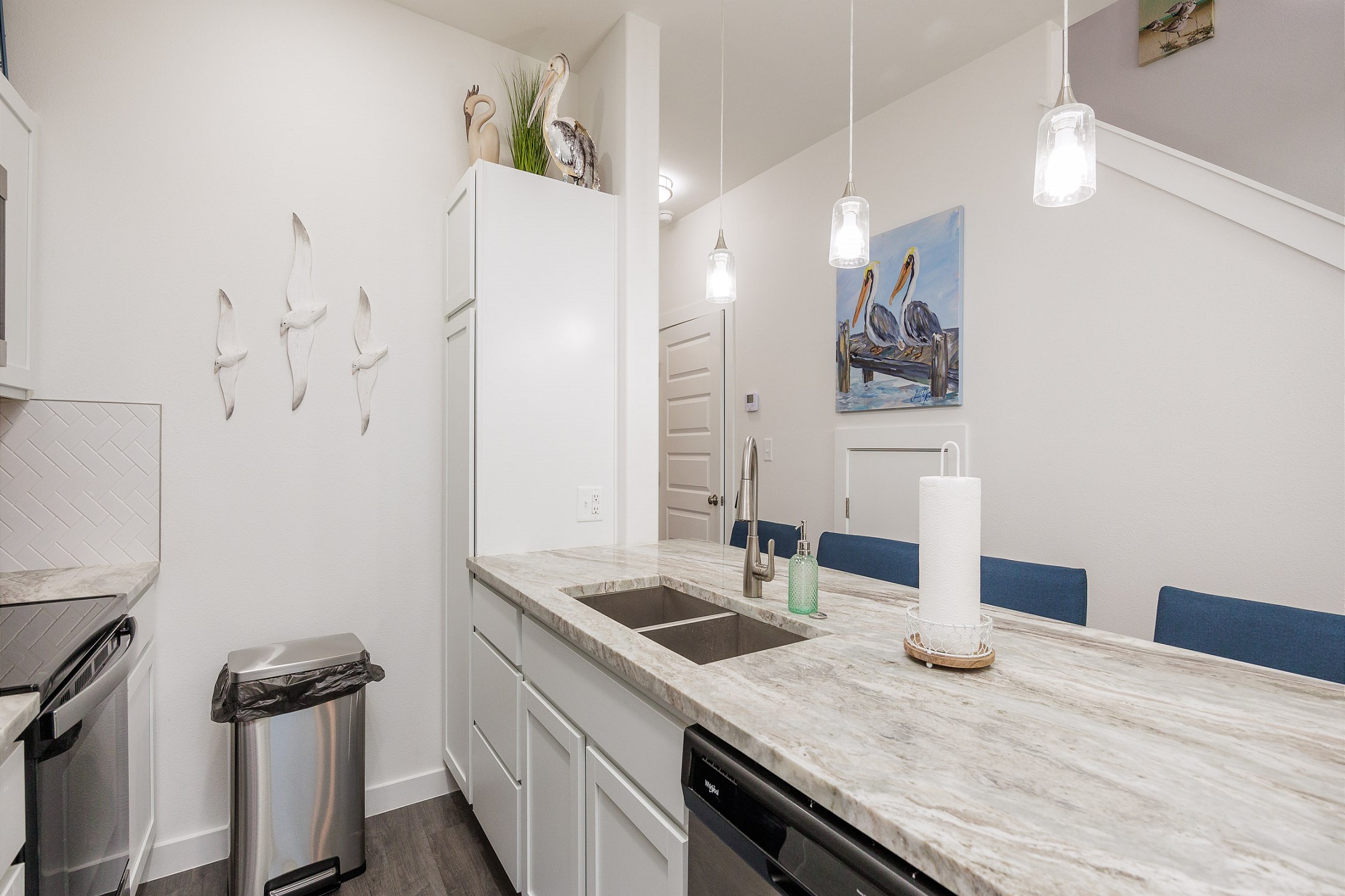 Coffee maker, toaster, cookware, dinnerware, and other kitchen essentials provided